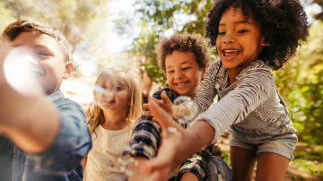 Outdoor Play in All Seasons_ Keeping Kids Safe in Buffalo Weather - MHA Blog Featured IMG